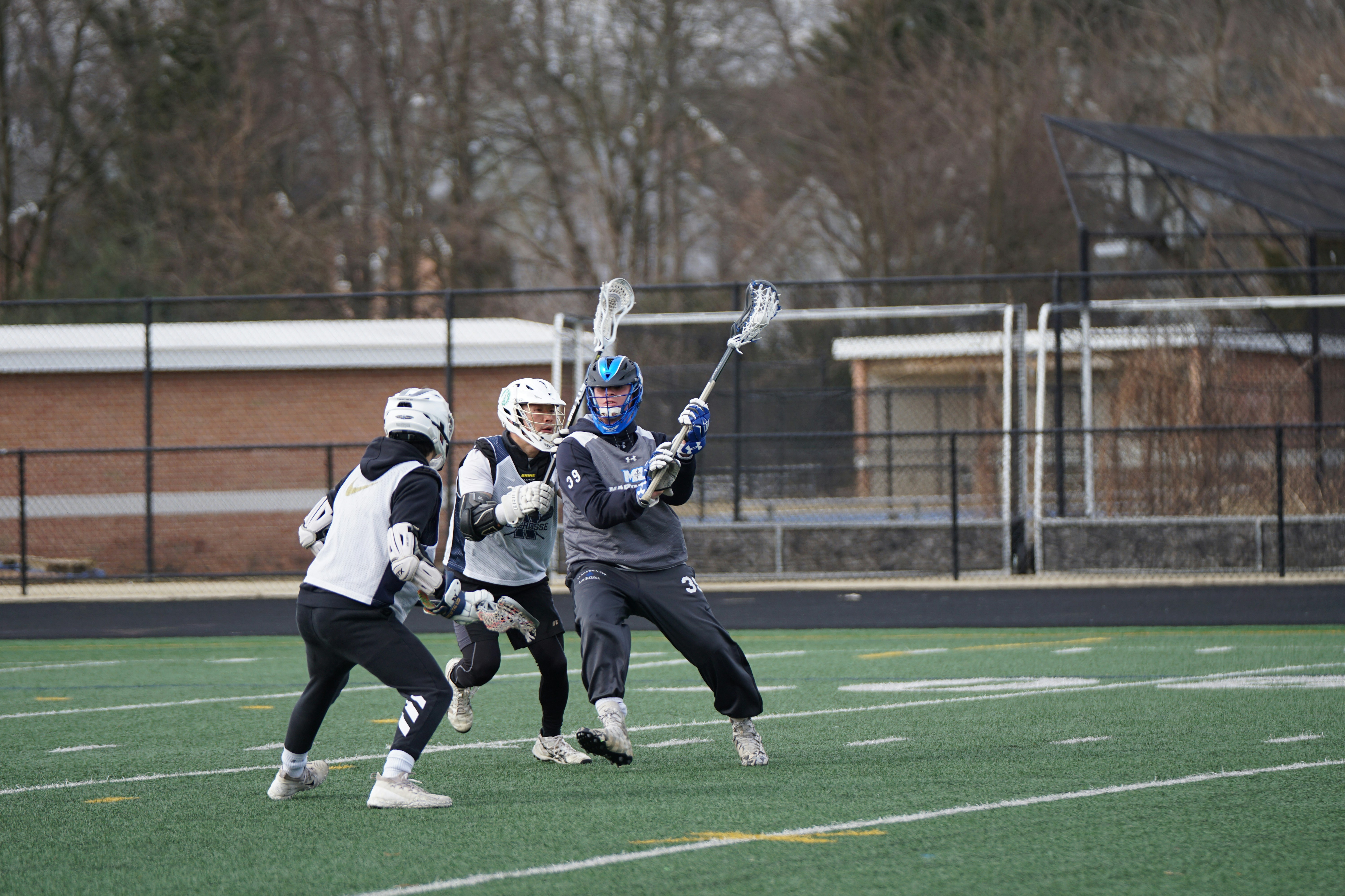 Boys lacrosse practice scrimmage